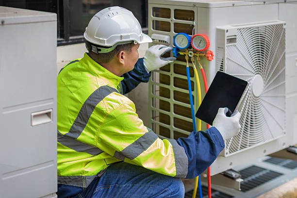Professional Heat Pump Repair technician working in Truxton, NY